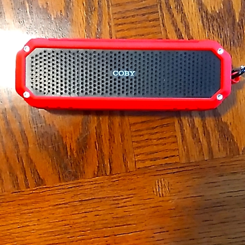Coby bluetooth speaker with flashlight